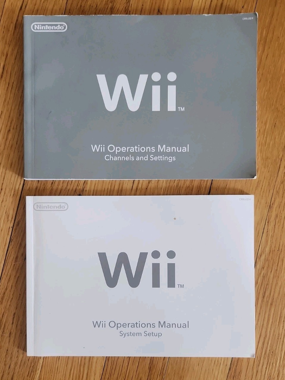 Nintendo Wii Console Bundle: 2 Remotes 2 Nunchucks, All Cords, 4 Games & Stand
