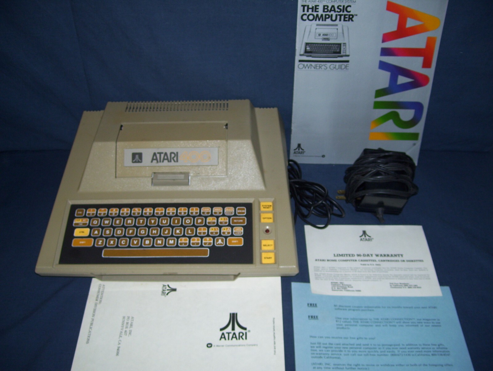 Atari 400 System Not Tested with AC Adapter Manual and Warranty Cards Used