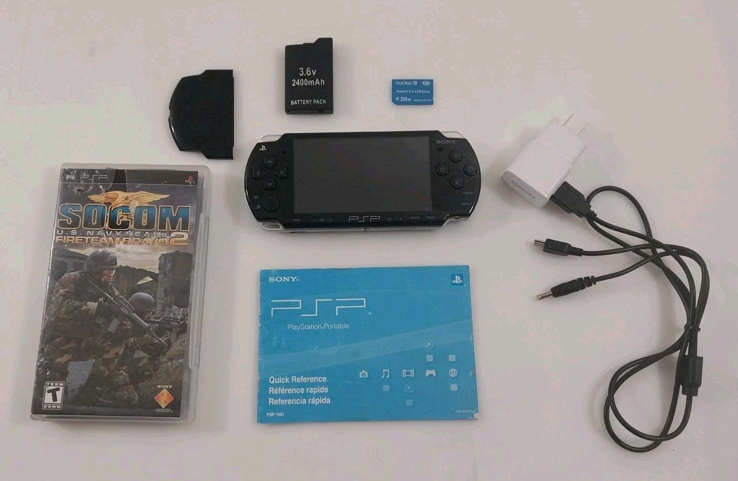 Sony PSP-2001 Piano Black Console 1 Game Manual Battery charger SD card