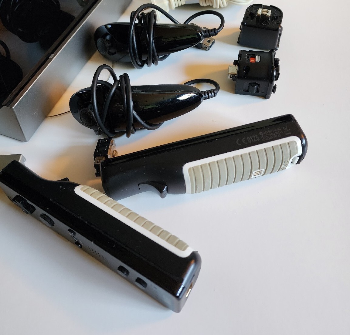 Nintendo Wii Black, 2 Wii Remote Plus, Charger Base With Assorted Games As Seen