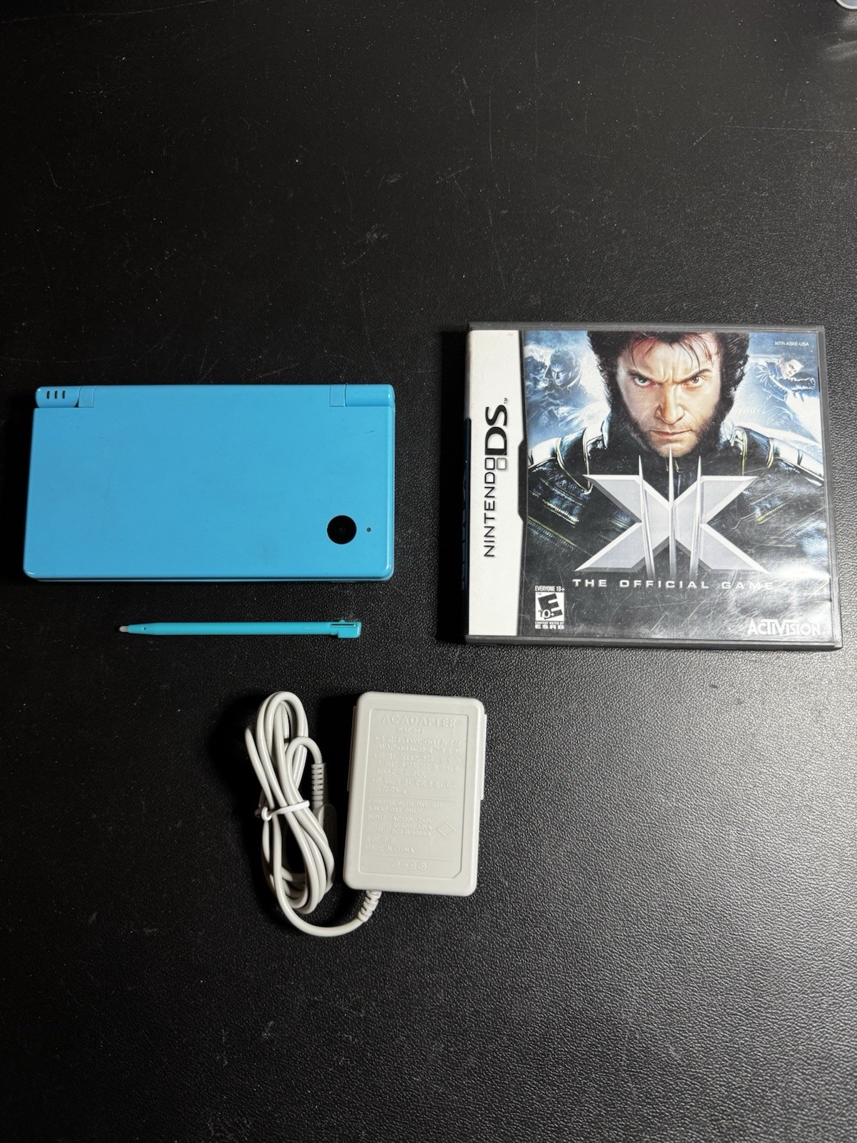 Nintendo DSi Ice Blue Handheld Console System W/ Charger & X-men Nice Condition