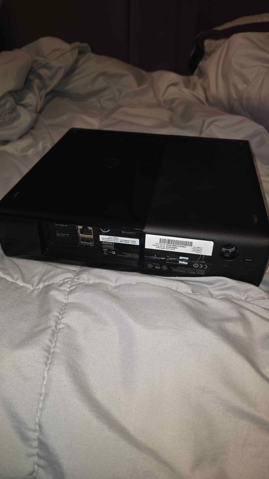 Microsoft Xbox 360 E 500GB Console with two controllers and 12 games