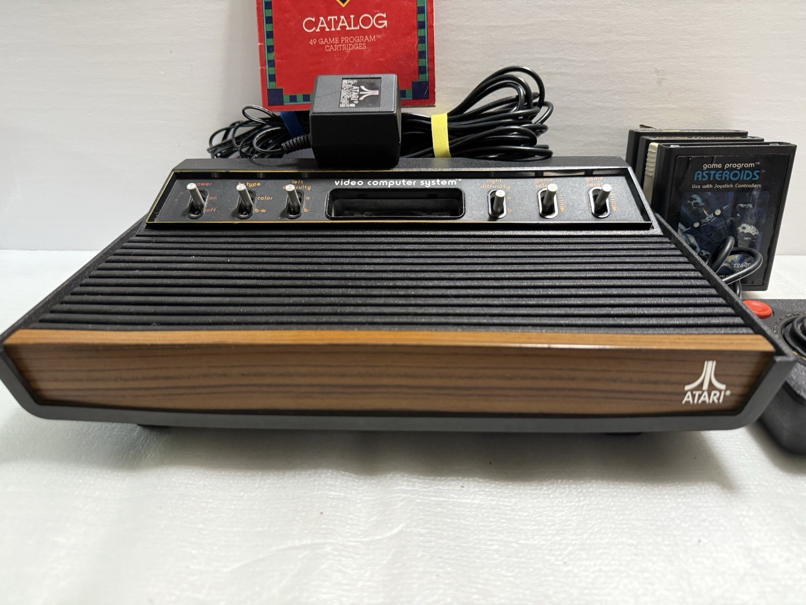 Atari 2600 Console Bundle Power Supply, Controller, 4 Games, Catalog