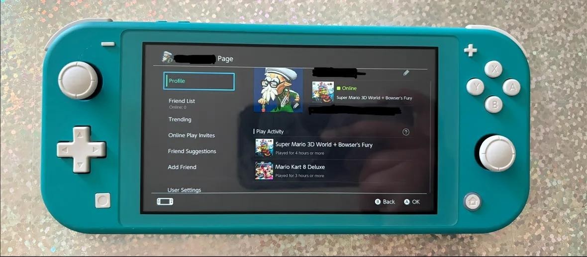 Nintendo Switch Lite Bundle with 3 Mario Games, Turquoise