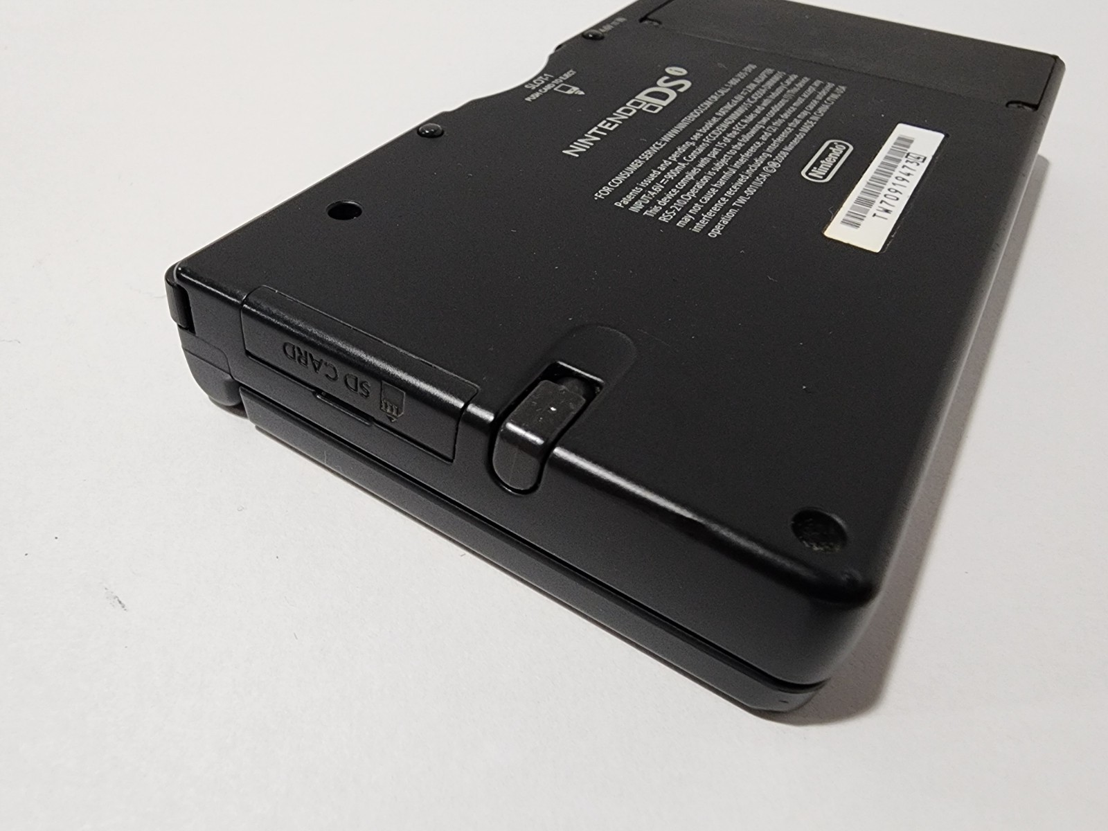 Nintendo DSi Launch Edition Black Handheld System with 7 Games