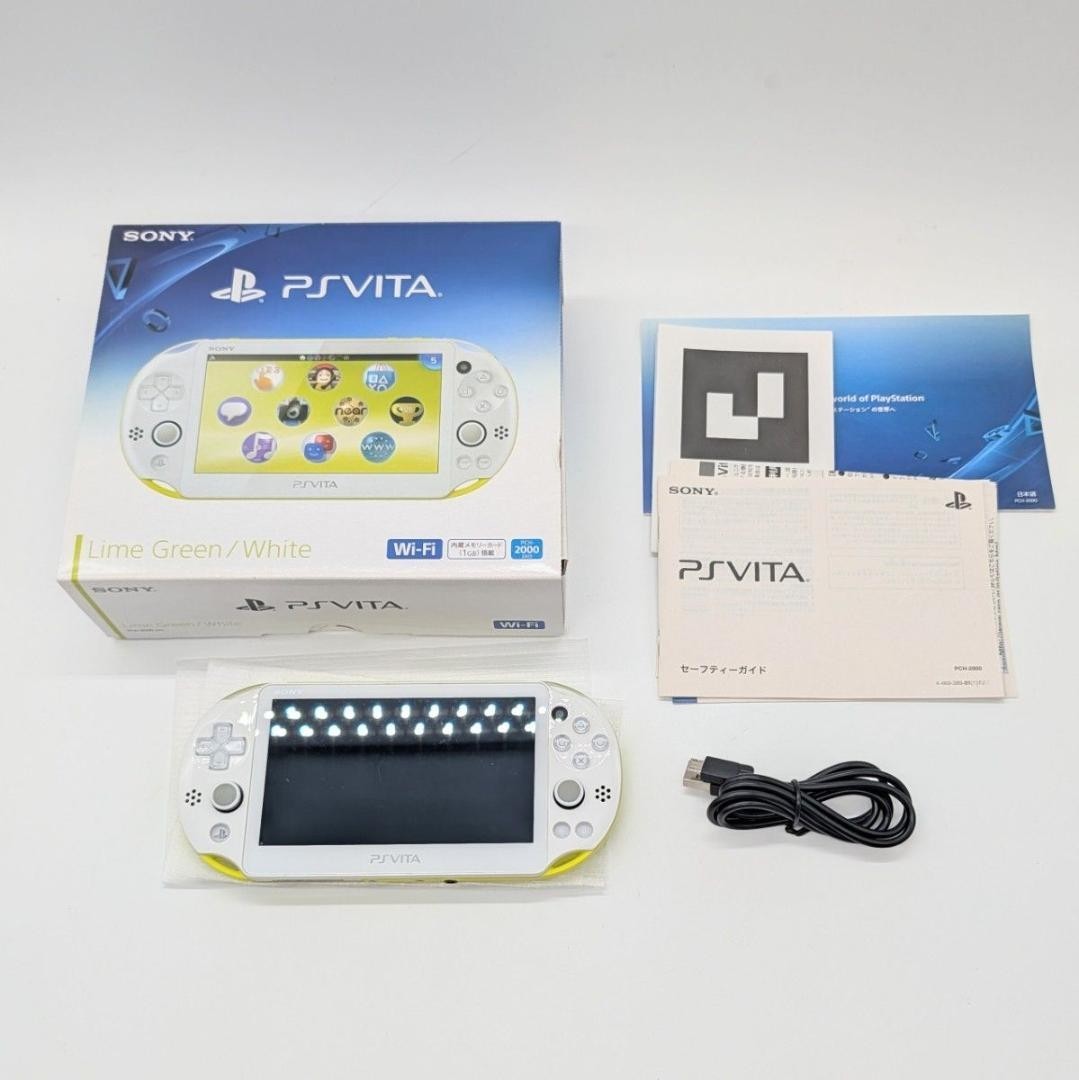Mint PS Vita PCH-2000 Lime Green White Tested Boxed