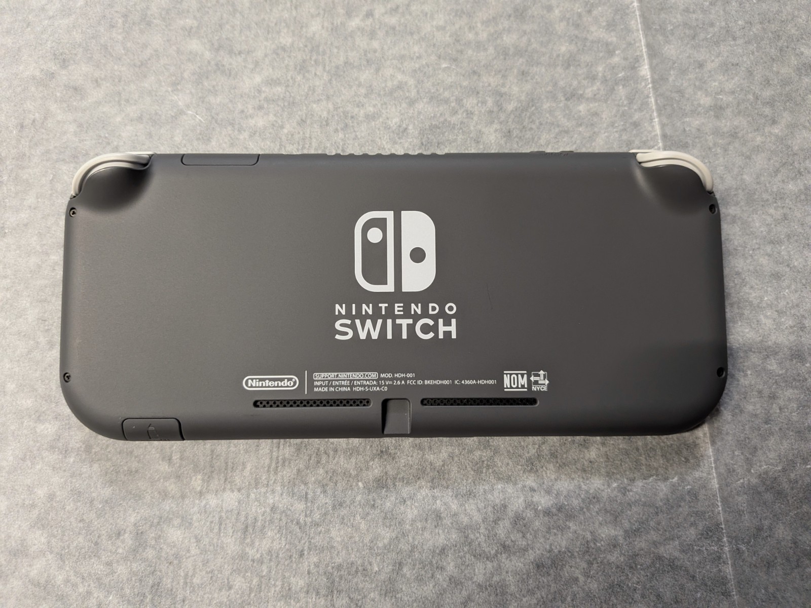 Nintendo Switch Lite Gray Handheld System with Original Box and Charger – Used